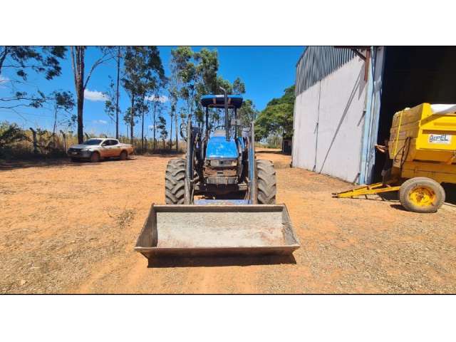 Uma pá carregadeira hidráulica agrícola Utility